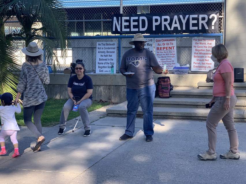 Jason and Jackie sharing the Gospel with passers by at Wilson Park in Torrance.