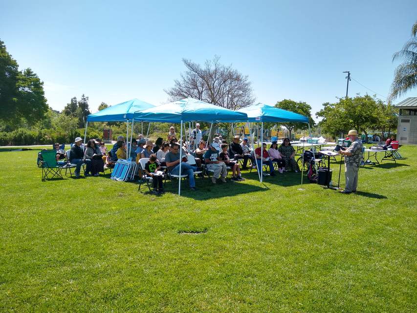 Pastor Miller leads the congregation in an outdoor worship service at Ken Malloy Harbor Regional Park.